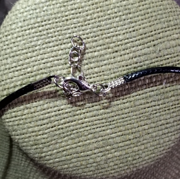 Goldtone teardrop pendant on black cord necklace - Picture 4 of 5